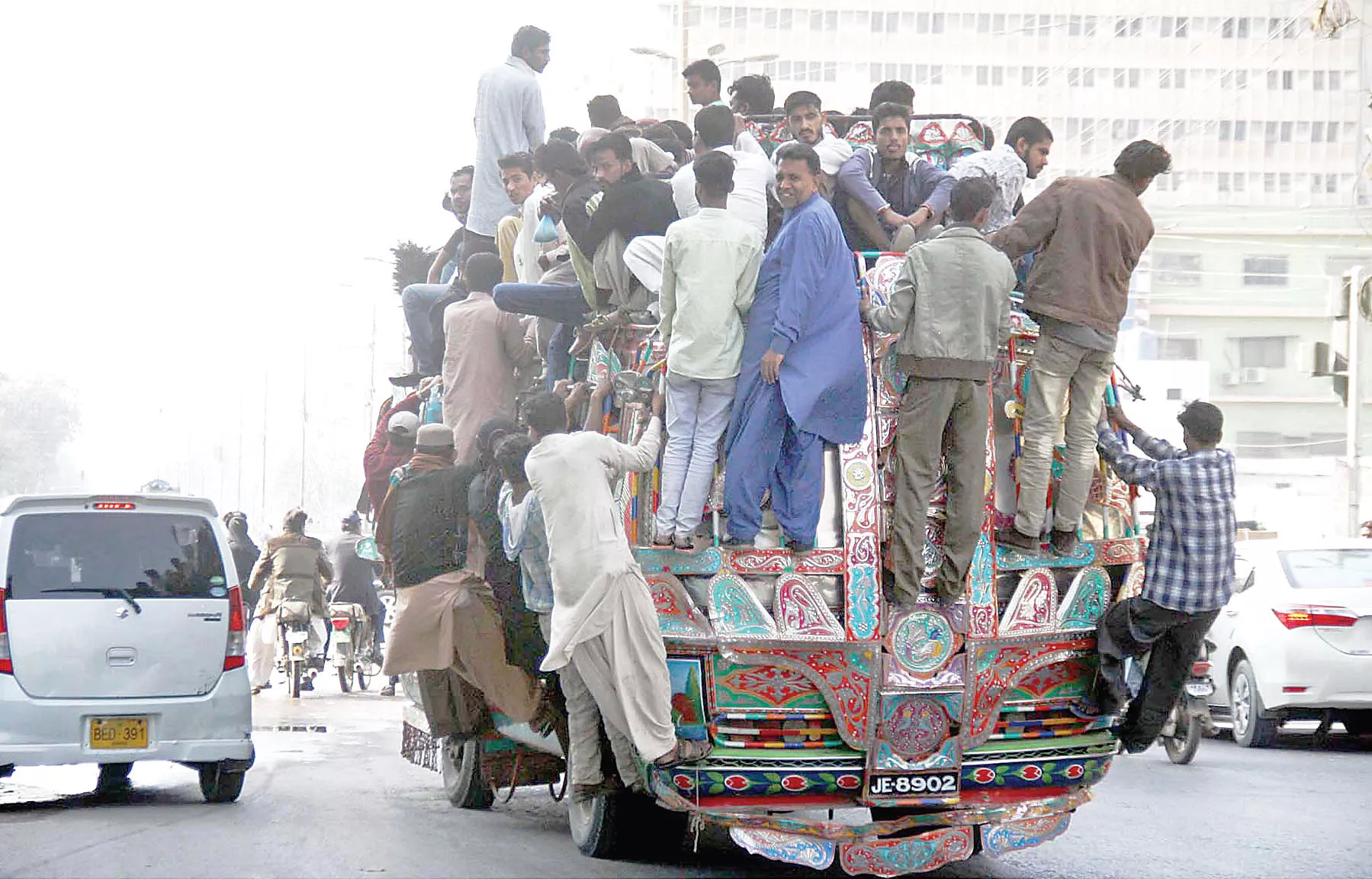 commuters struggle to find space on a public bus in karachi as transport remained minimal in the city due to the closure of cng stations across the province photo online commuters struggle to find space on a public bus in karachi as transport remained minimal in the city due to the closure of cng stations across the province photo online