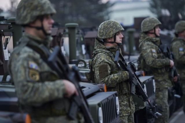 under the new law the kosovo security force would be gradually transformed into a professional army of 5 000 photo afp under the new law the kosovo security force would be gradually transformed into a professional army of 5 000 photo afp