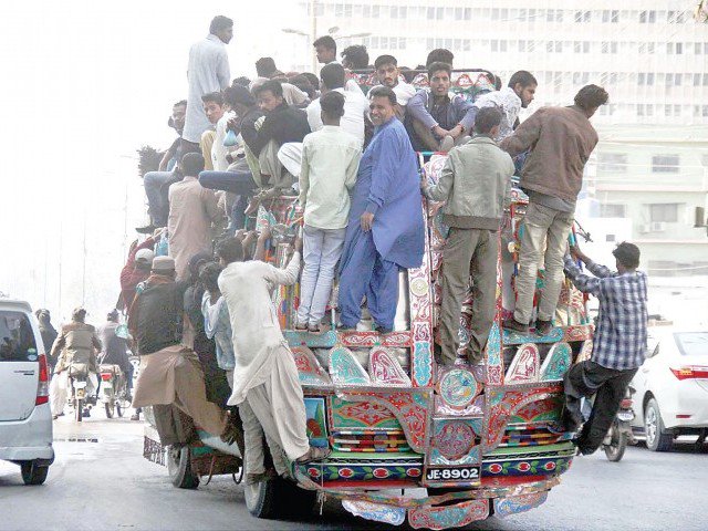 commuters struggle to find space on a public bus in karachi as transport remained minimal in the city due to the closure of cng stations across the province photo online