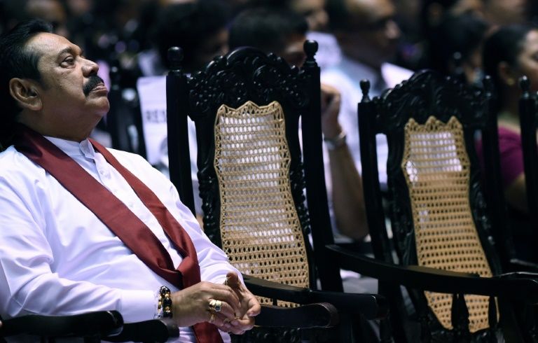 mahinda rajapakse will quit 039 to ensure stability of the nation 039 his son said photo afp