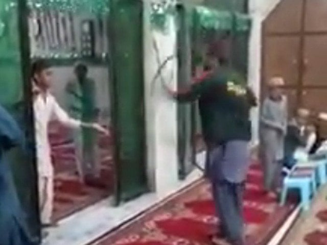 video showing children being beaten with a rubber belt in hyderabad went viral on social media screengrab video showing children being beaten with a rubber belt in hyderabad went viral on social media screengrab