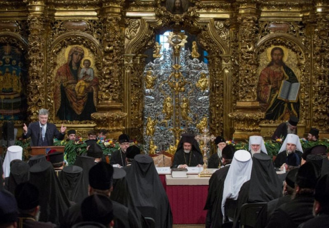 ukrainian president petro poroshenko was present at the historic synod as it created a new ukrainian orthodox church independent from russia photo afp