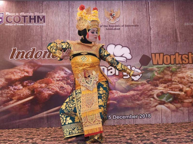 a performer presents traditional indonesian dance photo dna