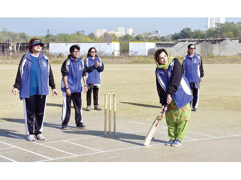 fehmida mirza on the pitch during a match between the parliamentarians and the media photo app