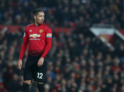 smalling extends man united contract to 2022