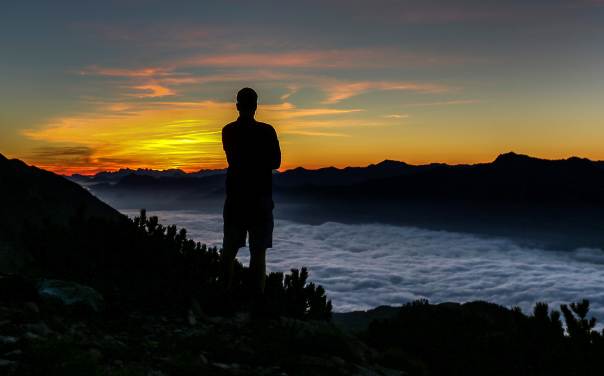 a man enjoys sunrise photo reuters