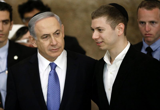 israeli prime minister benjamin netanyahu l and his son yair visit on march 18 2015 the western wall in jerusalem following his party likud 039 s victory in israel 039 s general election photo afp