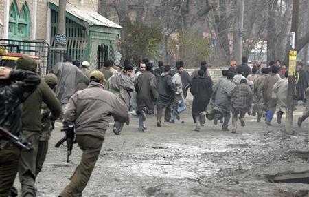 indian occupying forces chase kashmiri protesters photo reuters