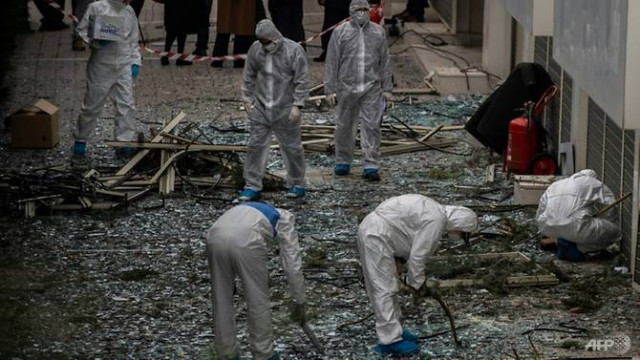 anti terrorist police opened an investigation into the attack that focused on greek extremist groups photo afp anti terrorist police opened an investigation into the attack that focused on greek extremist groups photo afp