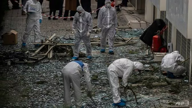 anti terrorist police opened an investigation into the attack that focused on greek extremist groups photo afp anti terrorist police opened an investigation into the attack that focused on greek extremist groups photo afp