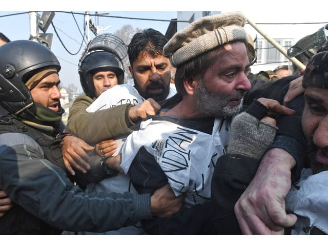 jammu and kashmir liberation front chief yasin malik c scuffles with indian police officer as they try to march during a protest march against the recent killings of civilians in srinagar on december 17 2018 photo afp jammu and kashmir liberation front chief yasin malik c scuffles with indian police officer as they try to march during a protest march against the recent killings of civilians in srinagar on december 17 2018 photo afp