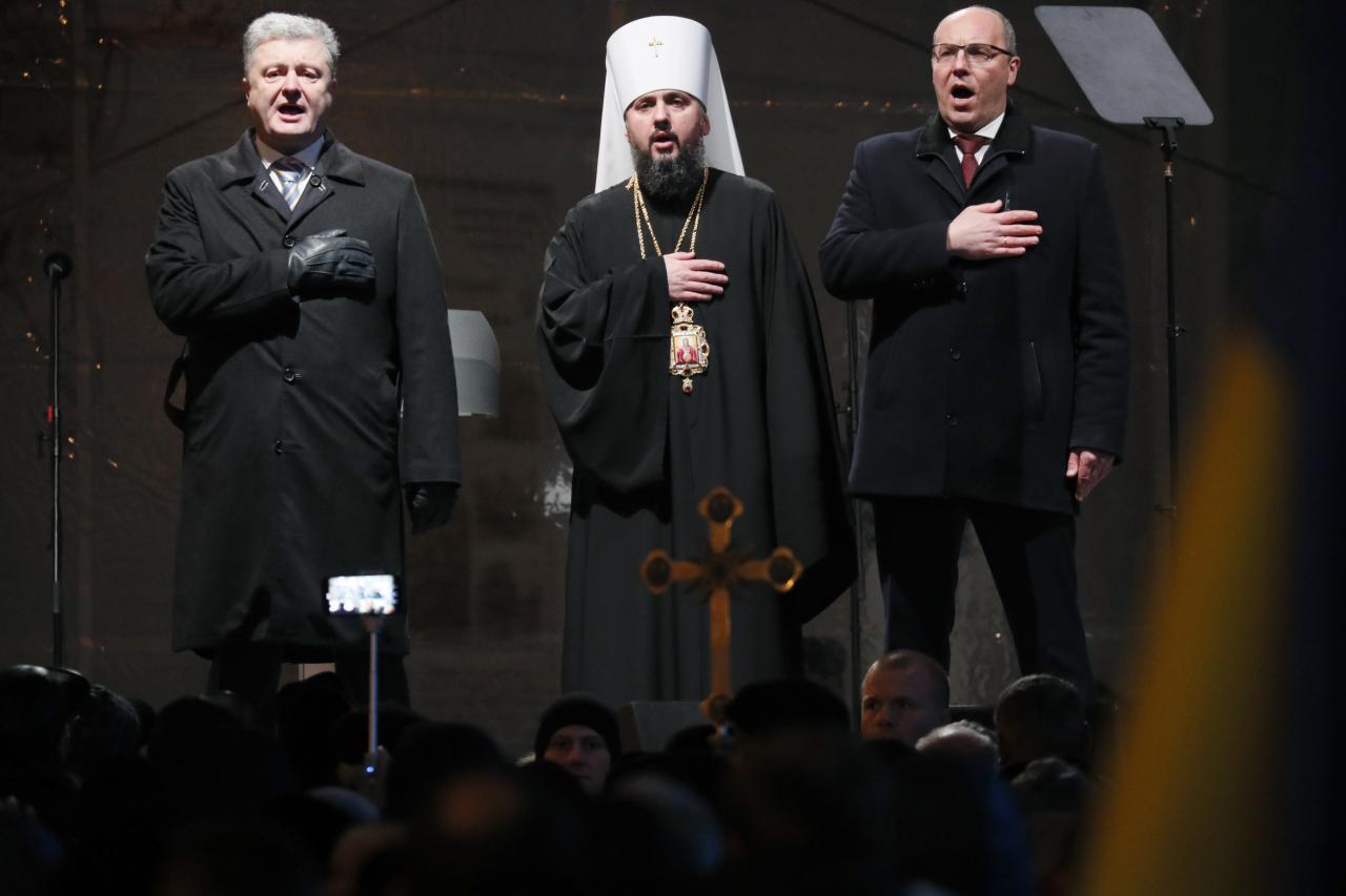 ukraine 039 s president petro poroshenko parliamentary speaker andriy parubiy and newly elected head of the independent ukrainian orthodox church metropolitan epifaniy dumenko sing national anthem at the saint sophia 039 s cathedral in kiev ukraine photo reuters