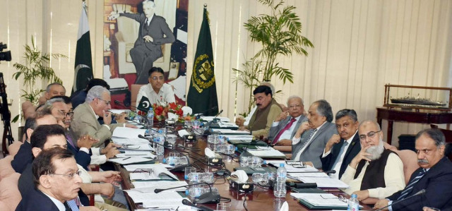 a file photo of finance minister asad umar chairing an ecc meeting photo radio pakistan a file photo of finance minister asad umar chairing an ecc meeting photo radio pakistan