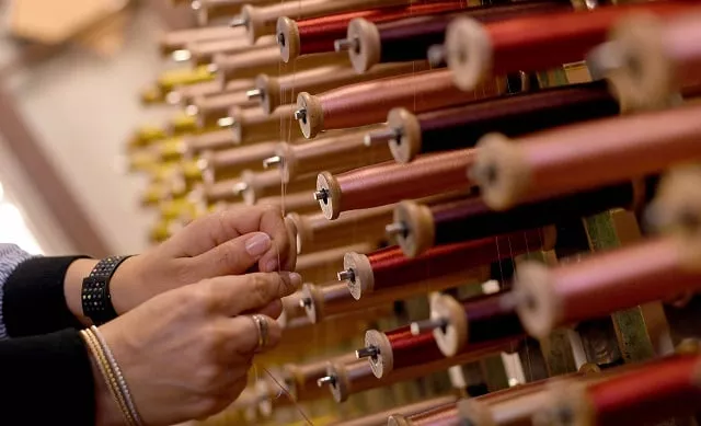 this picture taken on october 29 2018 shows a close up view of reels of thread in the laboratory of antico setificio fiorentino ancient silk factory in florence photo afp this picture taken on october 29 2018 shows a close up view of reels of thread in the laboratory of antico setificio fiorentino ancient silk factory in florence photo afp