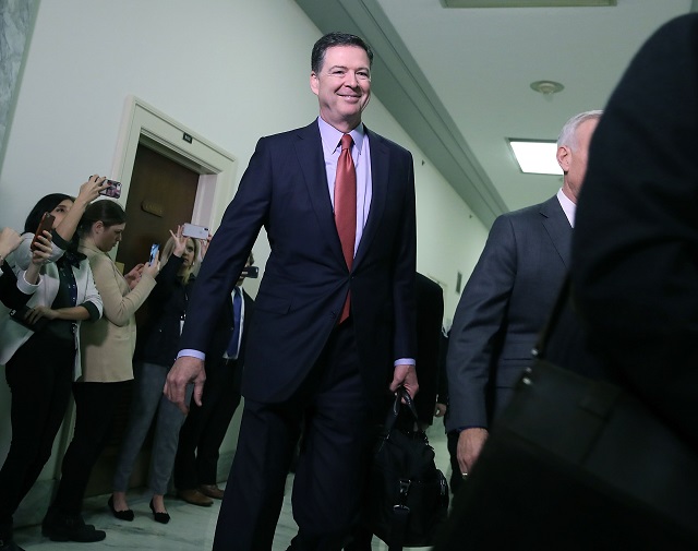 former federal bureau of investigation director james comey arrives at the rayburn house office building