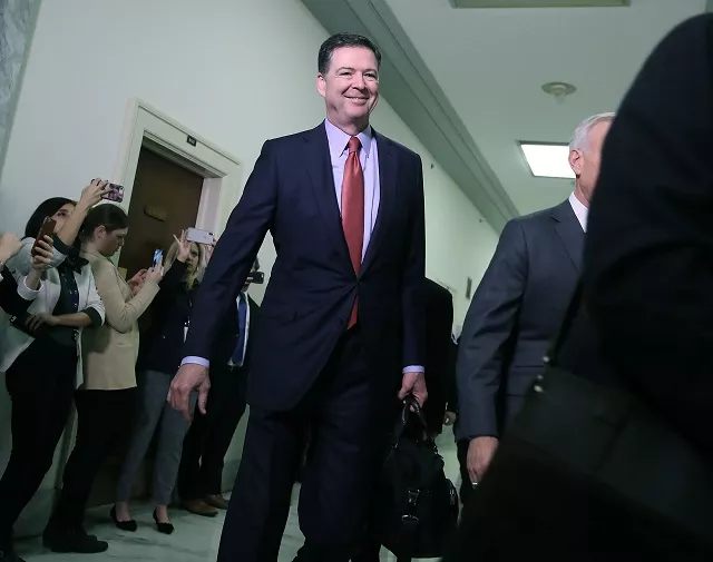 former federal bureau of investigation director james comey arrives at the rayburn house office building former federal bureau of investigation director james comey arrives at the rayburn house office building