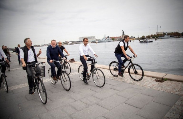 a handout photo released by the danish prime minister 039 s office shows french president emmanuel macron 2ndr and denmark 039 s prime minister lars lokke rasmussen 2ndl riding bicycles during a tour of the city on august 29 2018 in copenhagen photo afp a handout photo released by the danish prime minister 039 s office shows french president emmanuel macron 2ndr and denmark 039 s prime minister lars lokke rasmussen 2ndl riding bicycles during a tour of the city on august 29 2018 in copenhagen photo afp