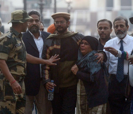 released indian prisoner hamid ansari c accompanied by his mother fauzia ansari 5l father nehal ansari 3r and brother dr khalid ansari 4r arrives at the india pakistan wagah border on december 18 2018 photo afp released indian prisoner hamid ansari c accompanied by his mother fauzia ansari 5l father nehal ansari 3r and brother dr khalid ansari 4r arrives at the india pakistan wagah border on december 18 2018 photo afp