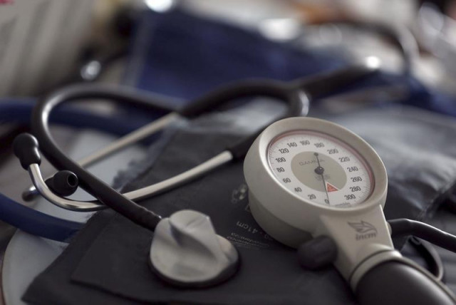 a photo illustration shows a stethoscope and blood pressure machine photo reuters a photo illustration shows a stethoscope and blood pressure machine photo reuters