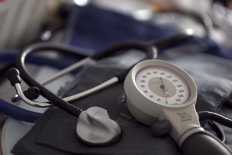 a photo illustration shows a stethoscope and blood pressure machine photo reuters