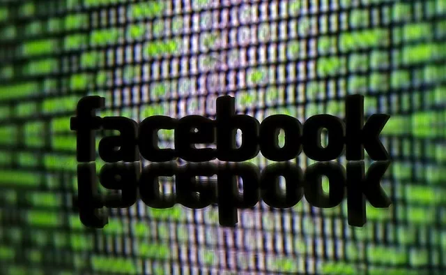 a 3d printed facebook logo is seen in front of displayed cyber code in this illustration taken march 22 2016 photo reuters a 3d printed facebook logo is seen in front of displayed cyber code in this illustration taken march 22 2016 photo reuters