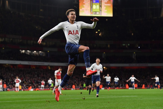 tottenham hotspur 039 s english midfielder dele alli celebrates scoring their second goal during the english league cup quarter final football match between arsenal and tottenham hotspur at the emirates stadium photo afp