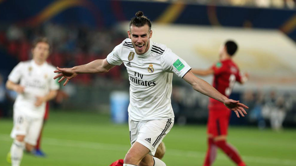 bale scored in the 44th 53rd and 55th minutes at the zayed sports city stadium to put madrid within touching distance of a record fourth success in this competition and their third triumph in a row photo afp