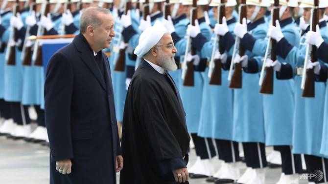 turkey 039 s president recep tayyip erdogan and iran 039 s president hassan rouhani arranged their summit before us president donald trump 039 s shock announcement of a us military pull out from syria photo afp