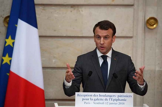 french president concedes to opponents of fuel tax hike photo news18