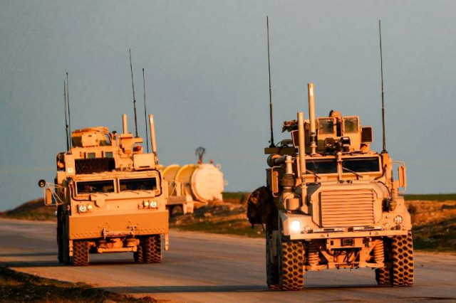 us marine corps tactical vehicles are seen near the syrian town of tal baydar in northeastern hasakeh province in syria photo afp