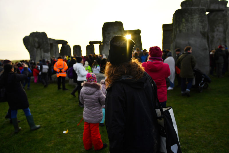 Thousands descend on Britain's ancient Stonehenge for winter solstice