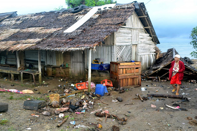 a local walks near her damaged house hit by tsunami at tanjung lesung district in pandeglang banten province indonesia december 23 2018 photo reuters a local walks near her damaged house hit by tsunami at tanjung lesung district in pandeglang banten province indonesia december 23 2018 photo reuters