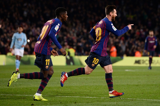 barcelona 039 s argentinian forward lionel messi celebrates scoring their second goal with barcelona 039 s french forward ousmane dembele during the spanish league football match photo afp