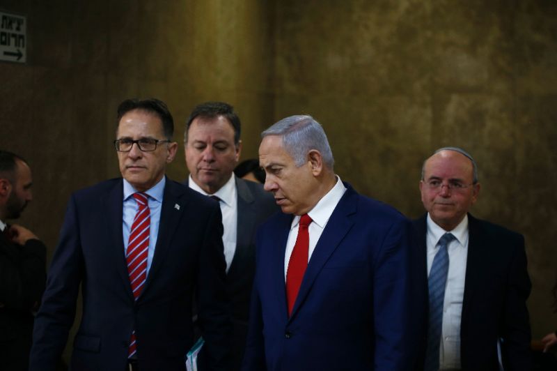 israeli prime minister benjamin netanyahu 2nd r arrives for the weekly cabinet meeting at the prime minister 039 s office in jerusalem israel photo afp