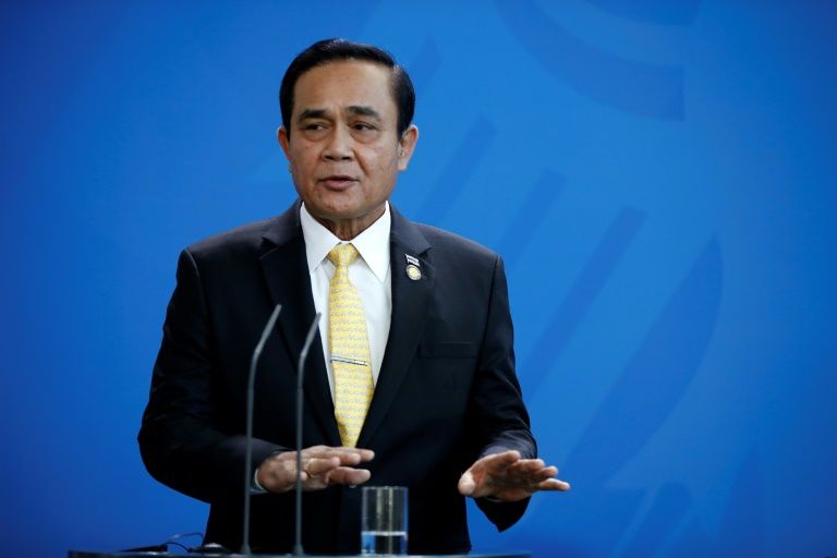 junta leader prayut chan o cha has repeatedly insisted that he has no interest in politics but has spent the last few months criss crossing the country ahead of an election in february photo afp