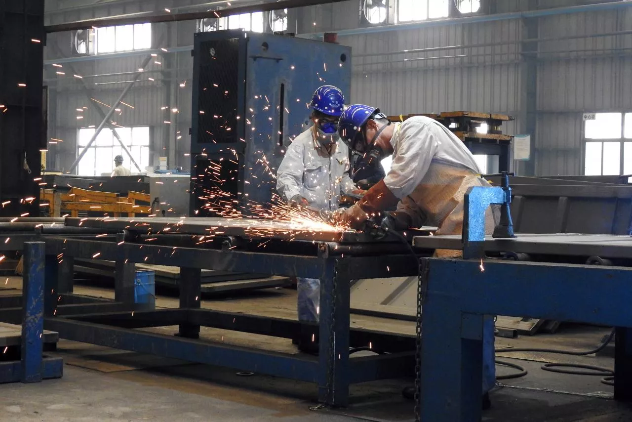 workers weld shipping container components at a container manufacturing company photo reuters workers weld shipping container components at a container manufacturing company photo reuters