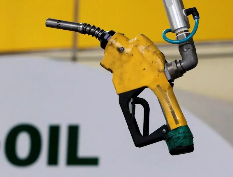 a gas pump is seen hanging from the ceiling at a petrol station photo reuters a gas pump is seen hanging from the ceiling at a petrol station photo reuters