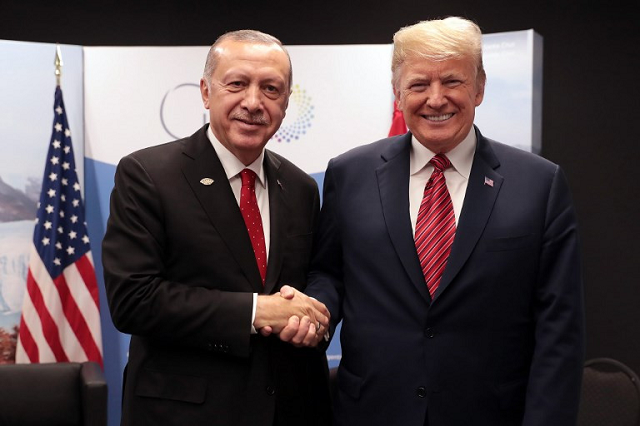a handout picture released by the turkish presidential palace press office shows turkey 039 s president recep tayyip erdogan l posing with us president donald trump during the g20 summit in buenos aires argentina on december 1 2018 photo afp