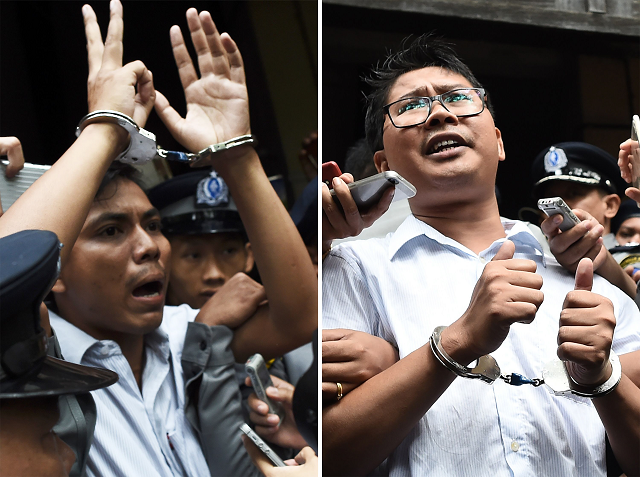 this combo file photo taken on september 03 2018 shows journalists kyaw soe oo l and wa lone r being escorted by police after their sentencing by a court to jail in yangon on september 3 2018 photo afp this combo file photo taken on september 03 2018 shows journalists kyaw soe oo l and wa lone r being escorted by police after their sentencing by a court to jail in yangon on september 3 2018 photo afp
