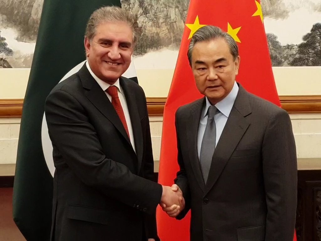 foreign minister shah mehmood qureshi with his chinese counterpart wang yi in beijing photo pti