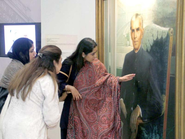 women take a closer look at a portrait of quaid e azam painted by prof saeed akhar at an exhibition at sbp museum on tuesday photo ppi women take a closer look at a portrait of quaid e azam painted by prof saeed akhar at an exhibition at sbp museum on tuesday photo ppi