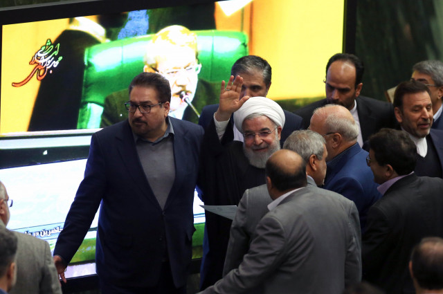 iran 039 s president hassan rouhani c gestures after presenting the 2019 2020 budget before parliament in the capital tehran on december 25 2018 photo reuters iran 039 s president hassan rouhani c gestures after presenting the 2019 2020 budget before parliament in the capital tehran on december 25 2018 photo reuters