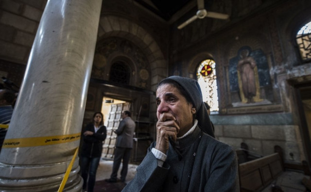 coptic christian mourns the deaths of fellow worshipers following a terrorist attack in cairo photo afp coptic christian mourns the deaths of fellow worshipers following a terrorist attack in cairo photo afp