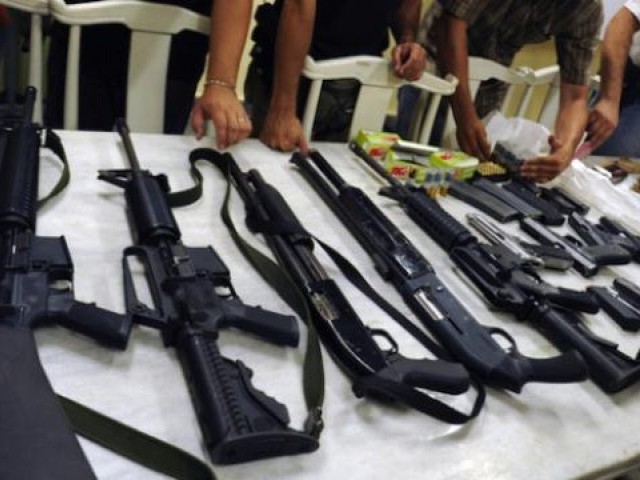 weapons recovered in a police raid photo express file