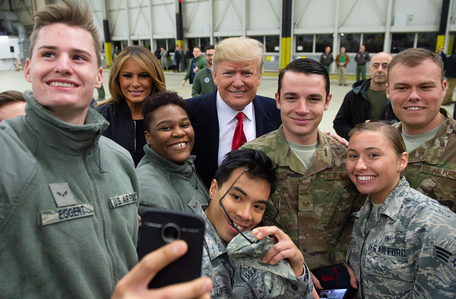 us president donald trump and first lady melania trump greet members of the us military during a stop at ramstein air base in germany photo afp