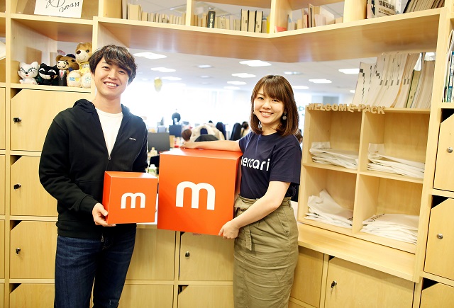 employees of mercari inc takashi murakami and ayano okuda pose for a photograph at the company office in tokyo japan december 5 2018 photo reuters