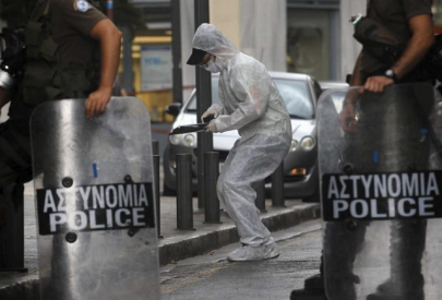 two injured in blast outside athens church two injured in blast outside athens church