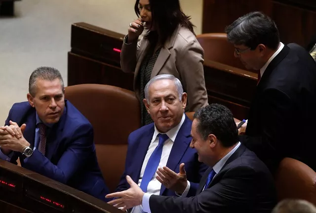 israeli prime minister benjamin netanyahu sits among members of his government during a parliament session in jerusalem on december 26 2018 israeli prime minister benjamin netanyahu sits among members of his government during a parliament session in jerusalem on december 26 2018