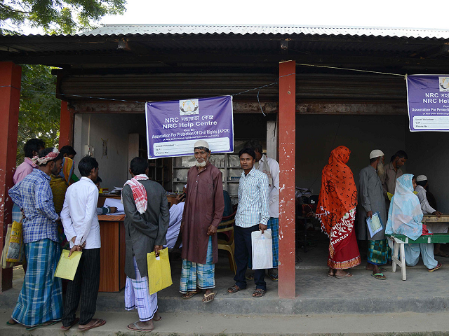 villagers gather to check their documents at a national register of citizens nrc help center for people whose names were not featured in the final draft of the nrc at hatisola village in kamrup district in india 039 s northeastern assam state photo afp