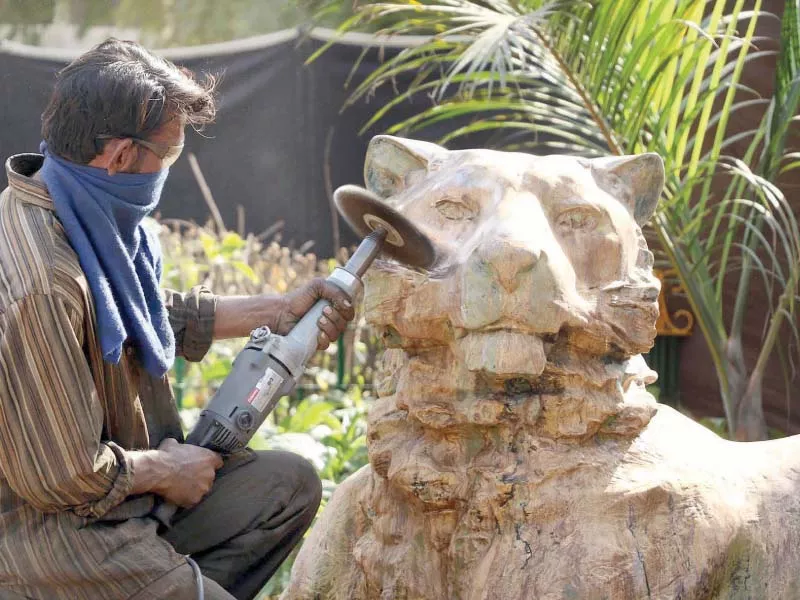 a worker reinstalls the metal statue of a lion which was given to mohatta palace museum eight years ago for an exhibition in an effort to make the zoo enjoyable for children photo online a worker reinstalls the metal statue of a lion which was given to mohatta palace museum eight years ago for an exhibition in an effort to make the zoo enjoyable for children photo online